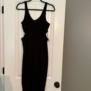 Black ribbed midi dress with side cut outs! Worn once!